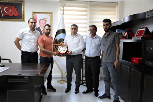 Ergani Sanayi Sitesi Başkanı Hasan Cengiz ve Yönetim Üyeleri Kaymakam Karaaslan'ı makamında ziyaret etti